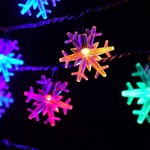 אורות חג המולד של Huacenmy קישוטי פתית שלג חיצוניים אורות מיתר סולאריים צבעוניים, 50 אורות LED 8 מצבים